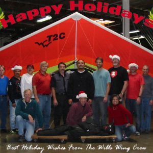 The Wills Wing Crew, 2011:
Standing, l-r: Eva Hanska, Gary Smith, Carlos Mendosa, Moises Cortes, Ken Howells, Chris Tompkins, Anthony Faletoi, George Mantoan, Rick Zimbelman, Matt Barker, Bill Blaty, Martin Maldonado
Crouching, l-r: Mike Meier, Steven Pearson, Linda Meier
Laying Down: Tony - our harness testing dummy

(Not pictured: Tom Blaty, Chris Wills)
